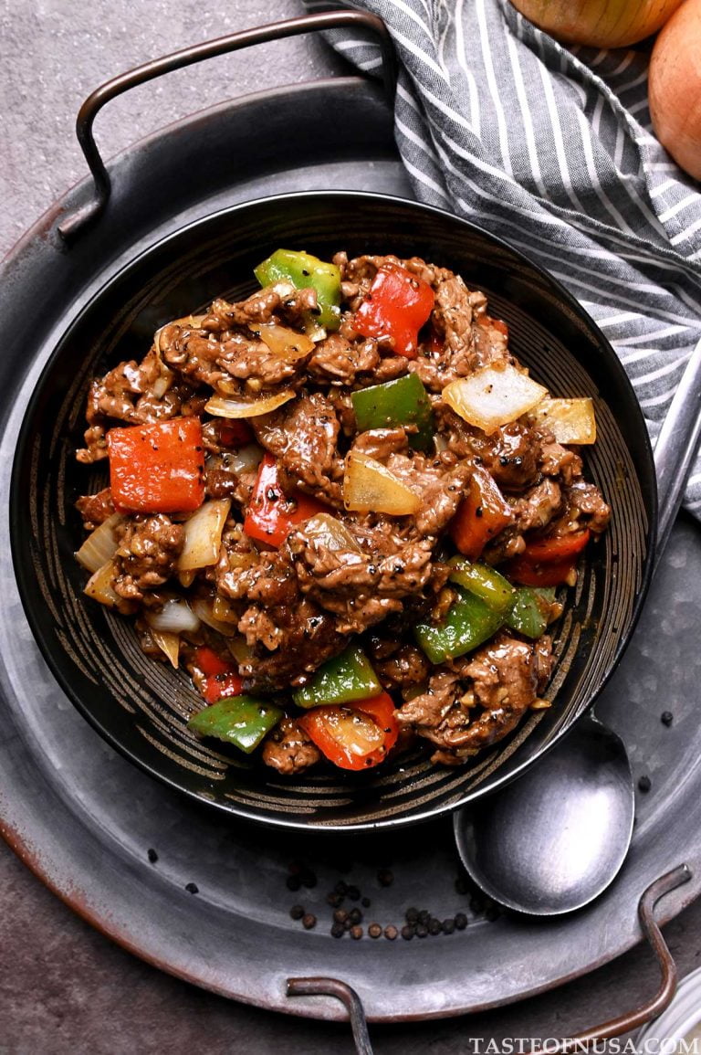 black pepper beef with onion, red bell pepper, and green bell pepper
